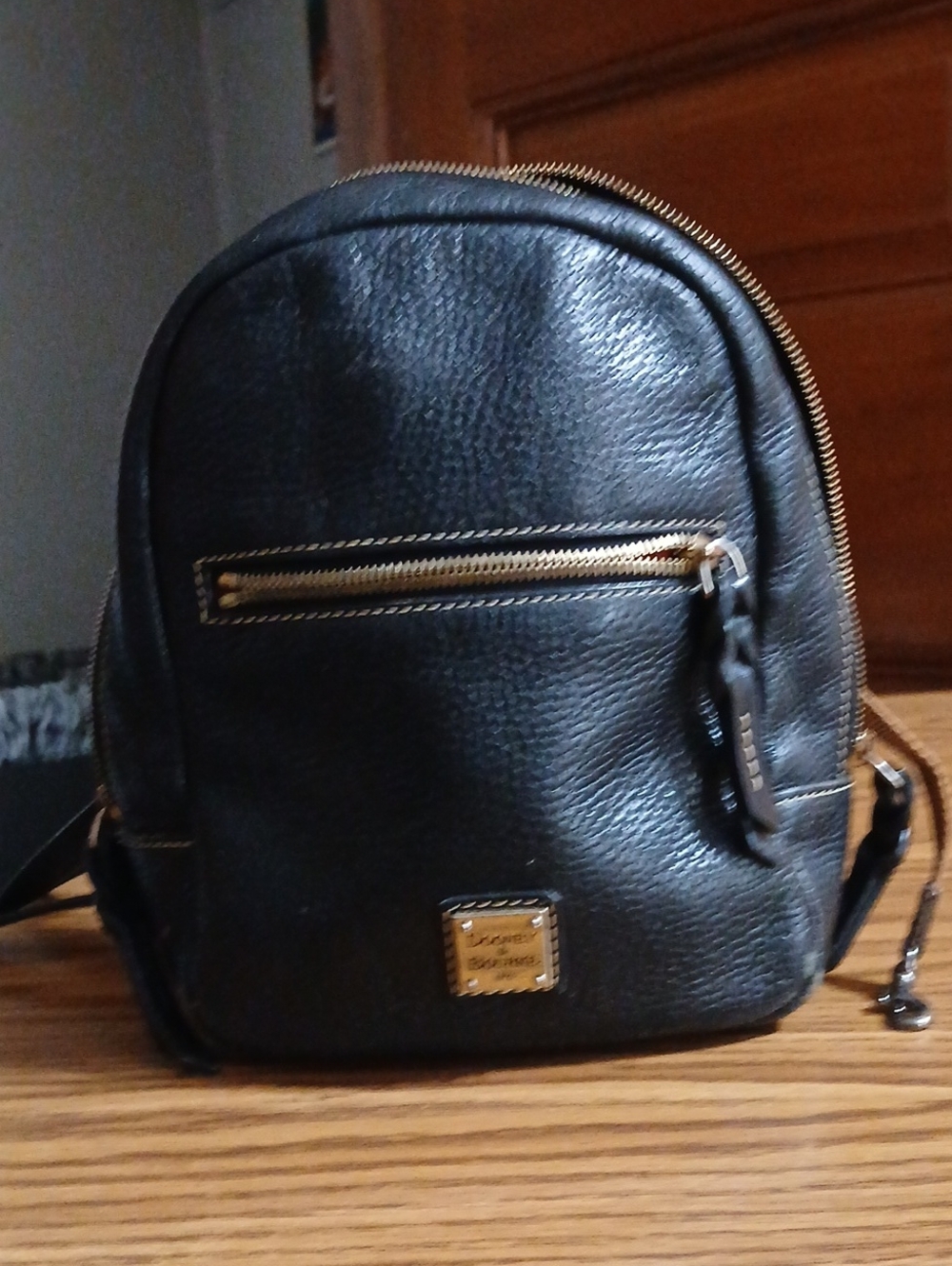 Dooney & Bourke Black Pebbled Leather Mini Backpack with Gold Hardware